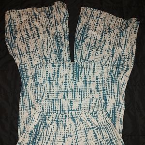 One piece tube top pant set. Cream colored with a sea green or bluish color.